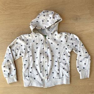 Cream zip hoodie with navy blue stars